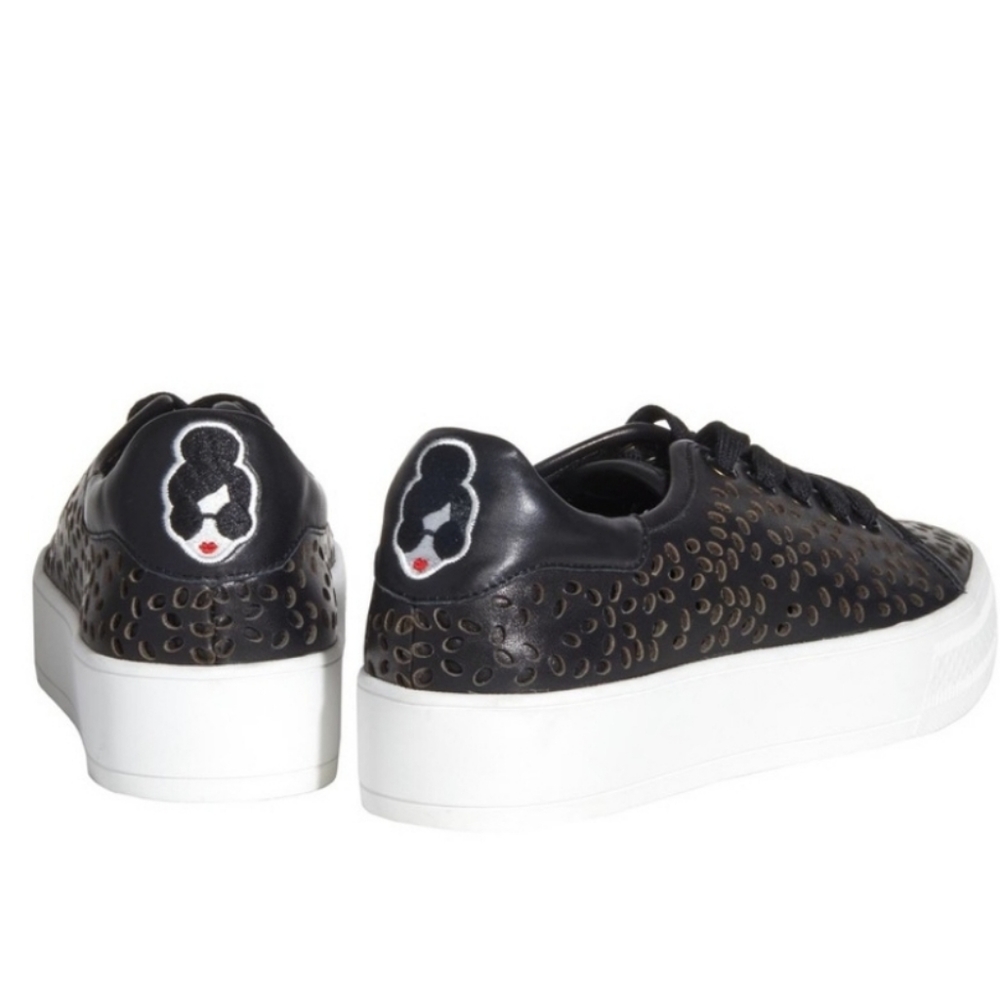 Alice + Olivia black leather pemton sneakers,  ladies size 38.5  or size 8